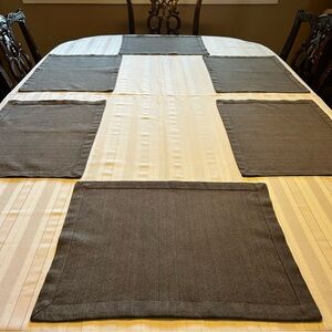 Set of six green woven placemats